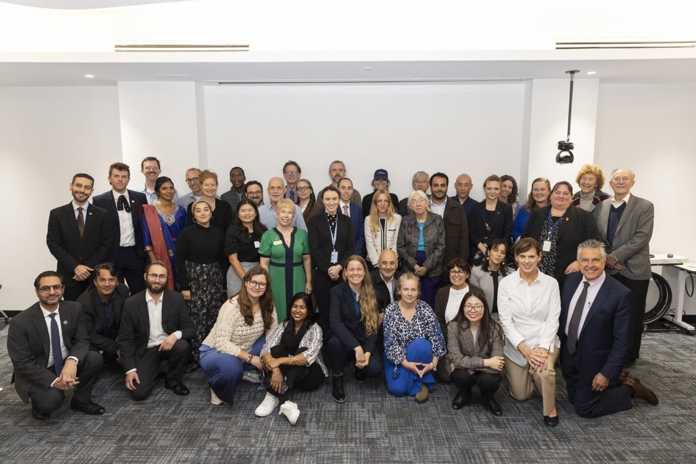 A group of people posing after a workshop